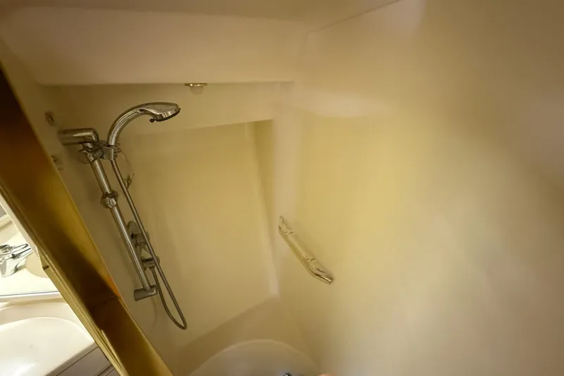 Slide: The Image of Shower area in 1998 Sea Ray 500 Sundancer yacht, featuring modern fixtures. - 72