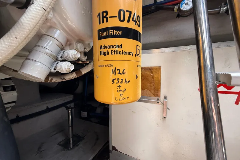 Slide: The Image of Fuel filter in engine room of 1998 Sea Ray 500 Sundancer yacht. - 89