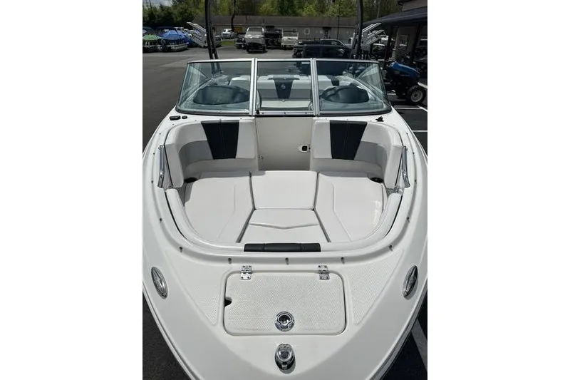 Slide: The Image of 2021 Chaparral 21 Surf boat with spacious seating and sleek design. - 13