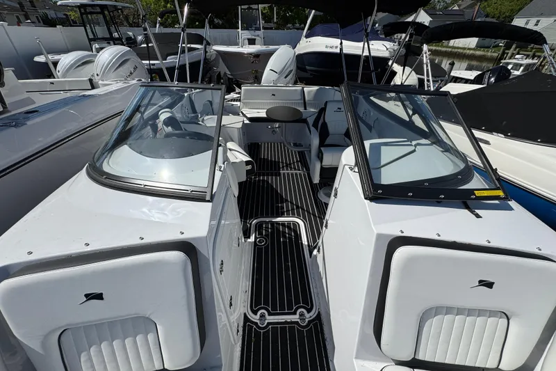 Slide: The Image of 2026 Stingray 231 DC boat interior with sleek design and modern features. - 28