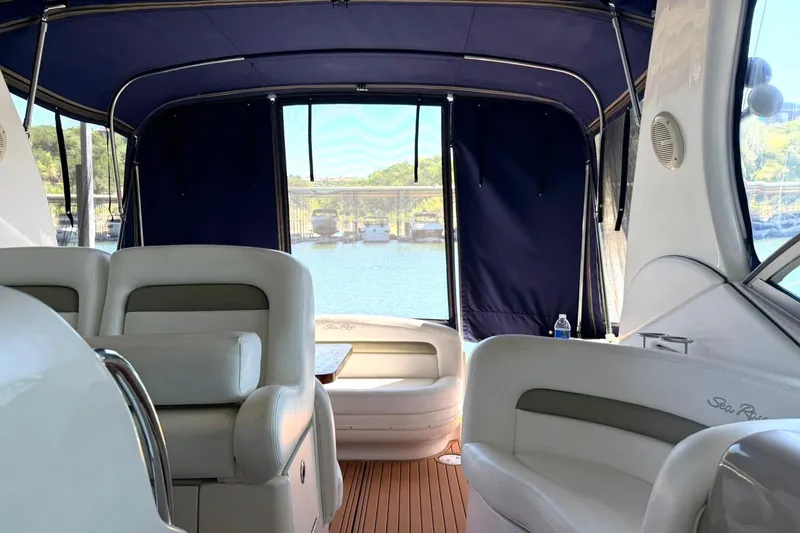 Slide: The Image of Interior view of a 2006 Sea Ray Sundancer 320 yacht with comfortable seating. - 25