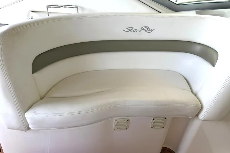 Slide: The Image of White leather seating on a 2006 Sea Ray Sundancer 320 boat. - 27