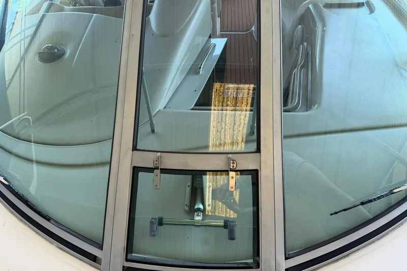 Slide: The Image of Close-up of 2006 Sea Ray Sundancer 320 windshield and cockpit area. - 36