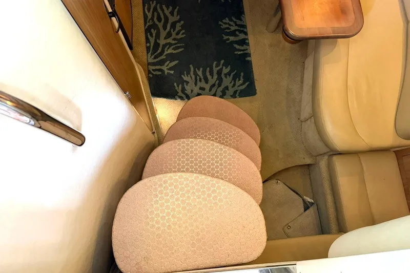 Slide: The Image of Interior of 2006 Sea Ray Sundancer 320 with carpeted steps and seating area. - 37