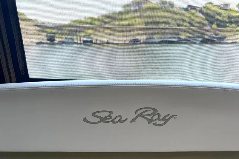 Slide: The Image of 2006 Sea Ray Sundancer 320 interior with scenic water view through window. - 60