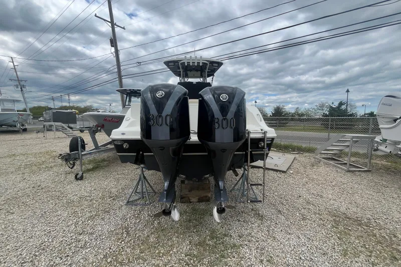 Slide: The Image of 2017 NauticStar 28 XS boat with twin 300 horsepower engines on display. - 3