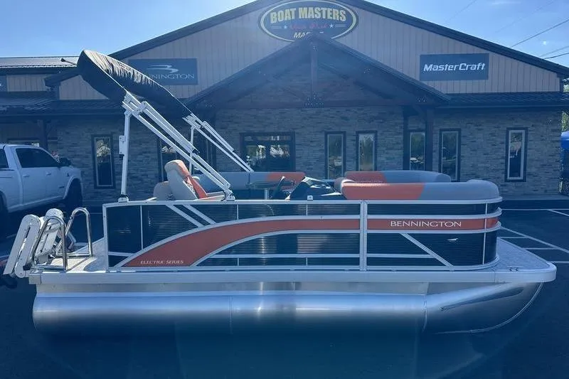 The Image of 2026 Bennington S L-Bench 168 SLJ pontoon boat displayed at dealership. - 1