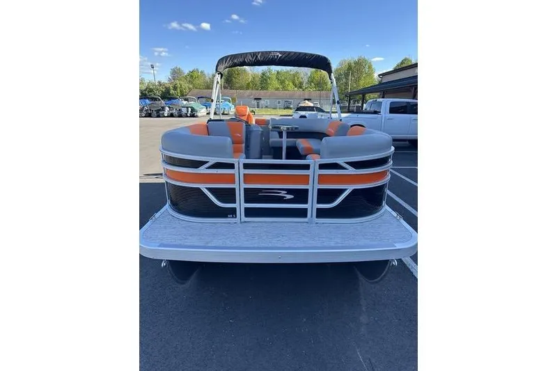 Slide: The Image of 2026 Bennington S L-Bench 168 SLJ pontoon boat with orange and gray seating. - 14