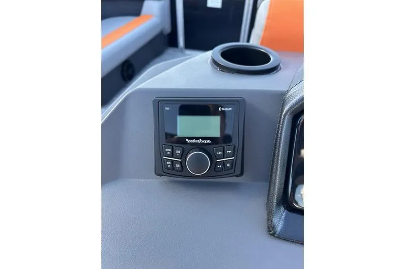 Slide: The Image of 2026 Bennington S L-Bench 168 SLJ boat dashboard with Rockford Fosgate audio system. - 16