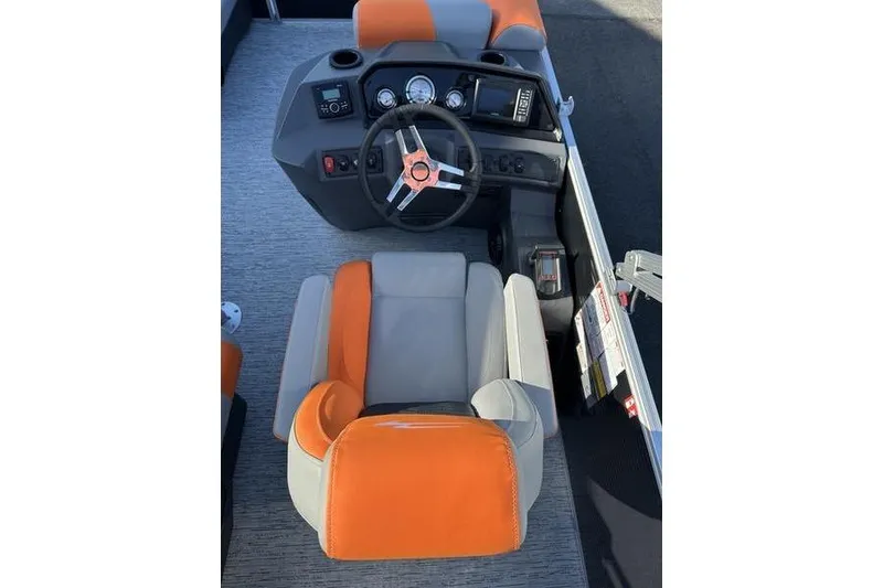 Slide: The Image of 2026 Bennington S L-Bench 168 SLJ boat interior with orange and gray seating. - 18