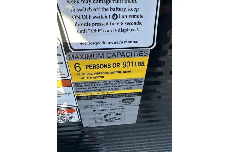 Slide: The Image of 2026 Bennington S L-Bench 168 SLJ capacity label, 6 persons or 901 lbs, 40 HP motor. - 2