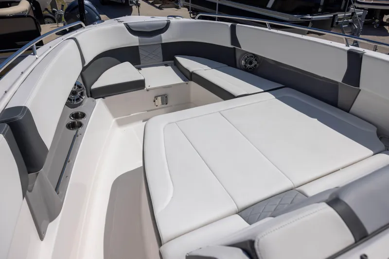 Slide: The Image of 2022 Chaparral 300 OSX boat interior with spacious seating and modern design. - 13