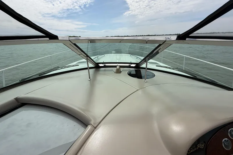 Slide: The Image of 2000 Sea Ray 410 Sundancer yacht, view from cockpit, cruising on open water. - 23