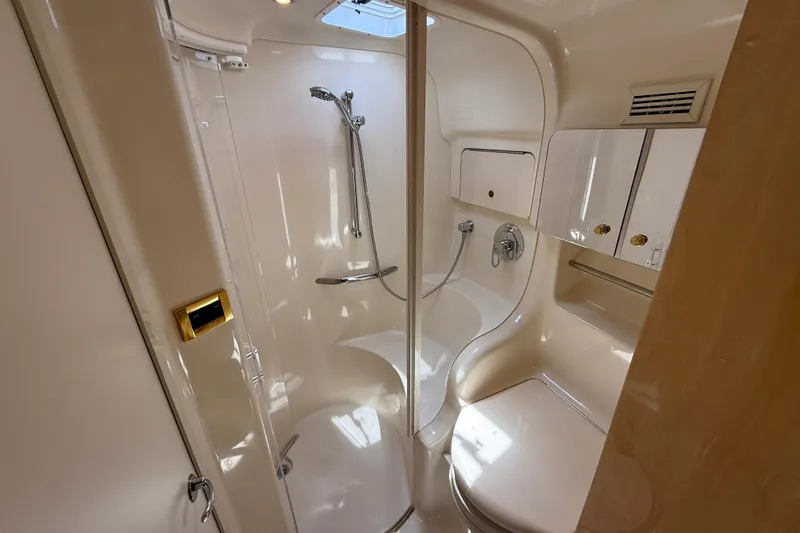 Slide: The Image of Luxurious bathroom in 2000 Sea Ray 410 Sundancer yacht with shower and toilet. - 42