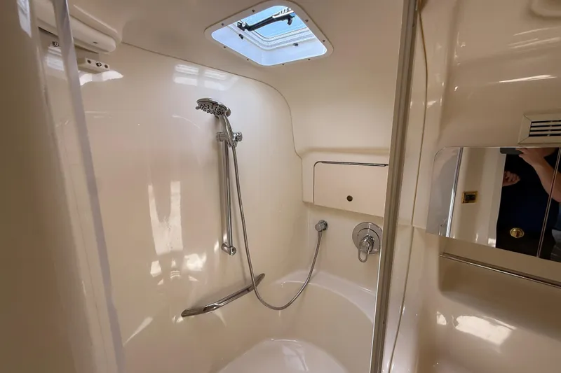 Slide: The Image of Bathroom interior of 2000 Sea Ray 410 Sundancer yacht with shower and mirror. - 43