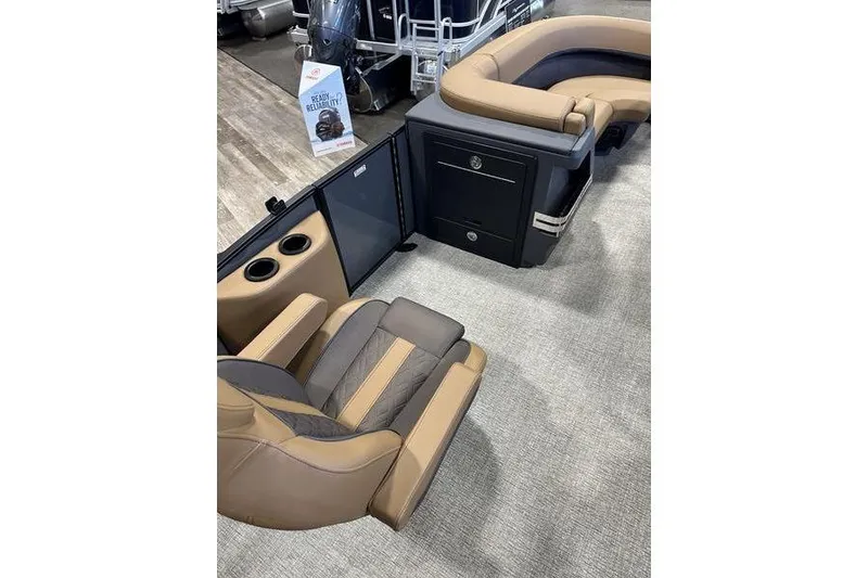 Slide: The Image of 2026 Bennington M Swingback 22 MSB interior with luxurious seating and storage compartments. - 13