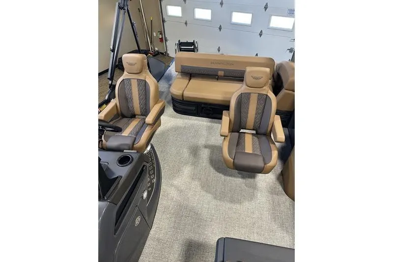 Slide: The Image of Interior of 2026 Bennington M Swingback 22 MSB with luxurious tan seating. - 18