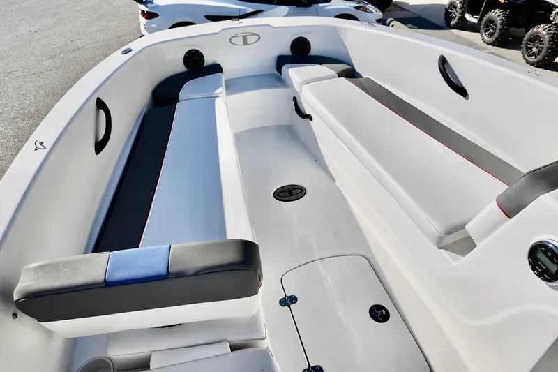 Slide: The Image of 2024 Tahoe T18 boat interior with sleek seating and modern design. - 8