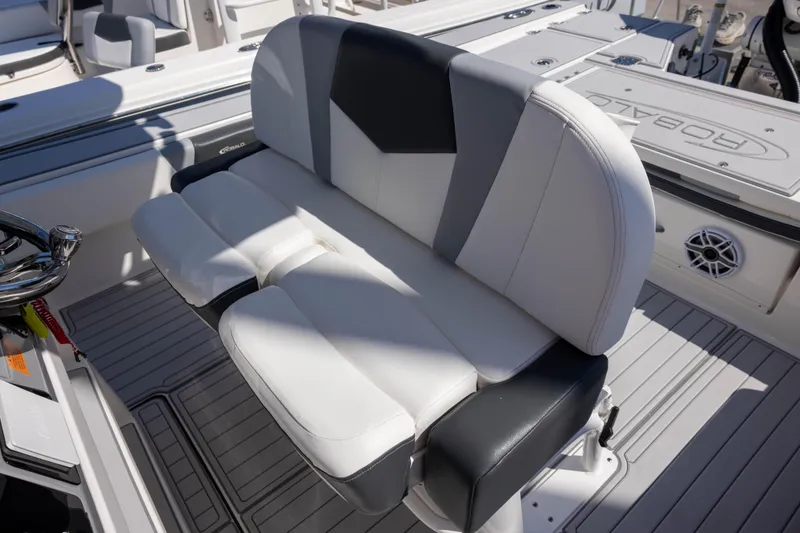 Slide: The Image of 2023 Robalo 266 Cayman boat seating with sleek, modern design and comfortable upholstery. - 9