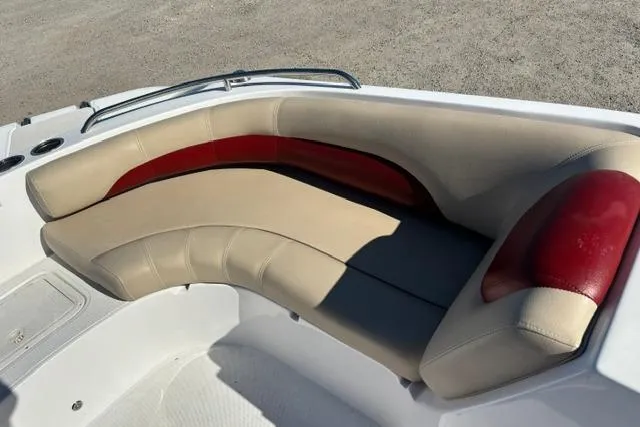 Slide: The Image of 2016 Hurricane SunDeck Sport 188 OB boat with beige and red cushioned seating. - 20