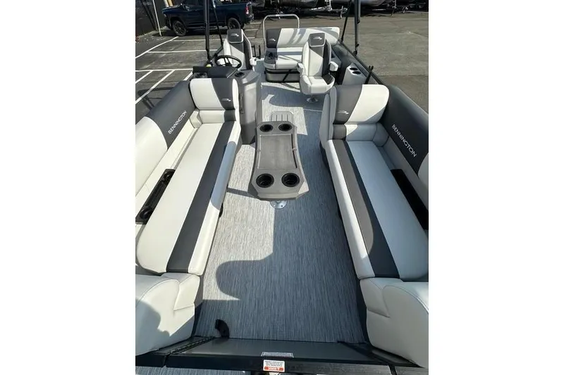 Slide: The Image of 2026 Bennington S Swingback 22 SSB pontoon boat interior with seating and cup holders. - 10