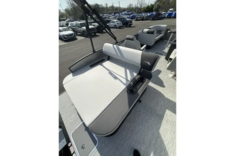 Slide: The Image of 2026 Bennington S Swingback 22 SSB pontoon boat with spacious seating and modern design. - 17