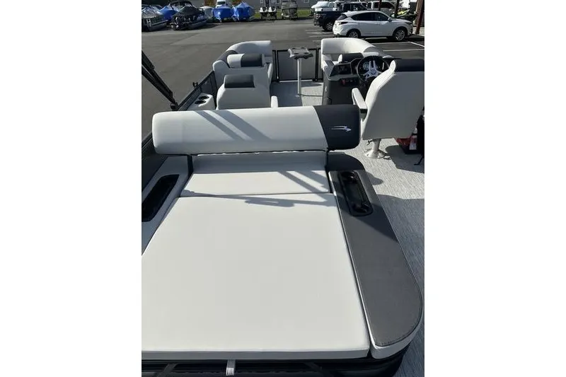 Slide: The Image of 2026 Bennington S Swingback 22 SSB pontoon boat interior with plush seating and modern design. - 20