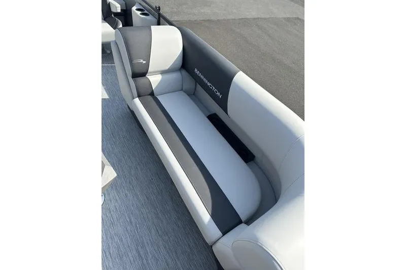 Slide: The Image of 2026 Bennington S Swingback 22 SSB boat seat, gray and white upholstery, outdoor setting. - 8