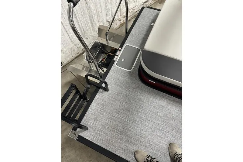 Slide: The Image of 2026 Bennington S Swingback 22 SSB boat deck with seating and ladder. - 5
