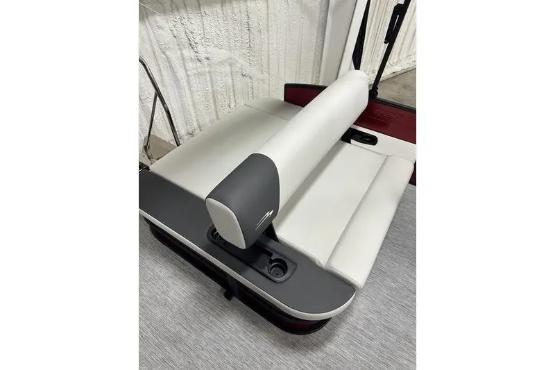 Slide: The Image of 2026 Bennington S Swingback 22 SSB boat seat, featuring sleek white and gray upholstery. - 9