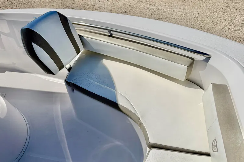 Slide: The Image of Century 2301 Center Console 2022 boat seating area with cushioned seats and backrest. - 10