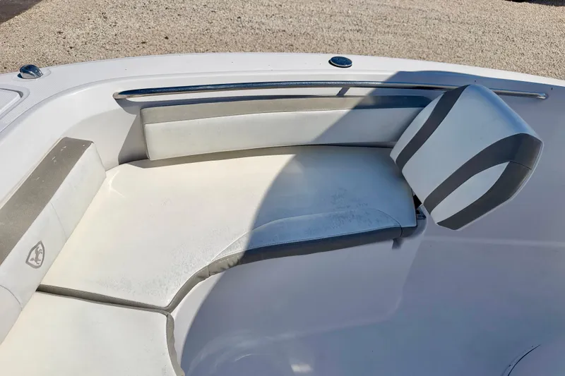 Slide: The Image of Century 2301 Center Console 2022 boat interior with cushioned seating and sleek design. - 11