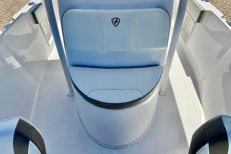 Slide: The Image of 2022 Century 2301 Center Console boat interior with seating and console design. - 12