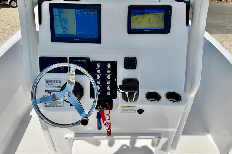 Slide: The Image of Century 2301 Center Console 2022 dashboard with steering wheel, controls, and navigation screens. - 16
