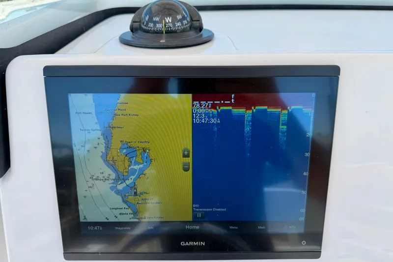 Slide: The Image of Garmin navigation display on 2022 Century 2301 Center Console boat, showing map and sonar data. - 17