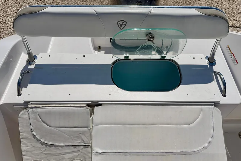 Slide: The Image of 2022 Century 2301 Center Console boat with seating and storage area. - 27