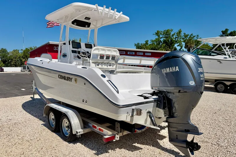 Slide: The Image of 2022 Century 2301 Center Console boat with Yamaha engine on trailer. - 7