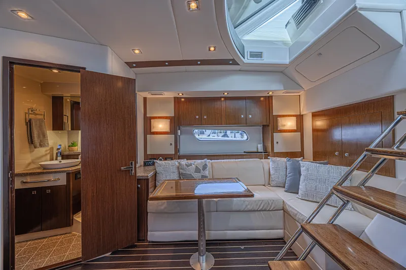 Slide: The Image of Luxurious interior of 2012 Cruisers Yachts 48 Cantius with elegant seating and modern amenities. - 32