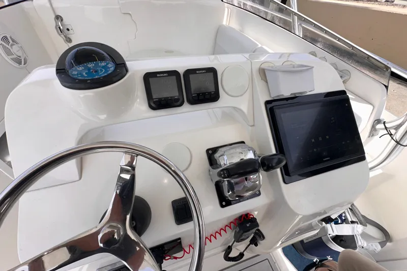 Slide: The Image of Helm of 2007 Intrepid 310 Walkaround with navigation instruments and steering wheel. - 6