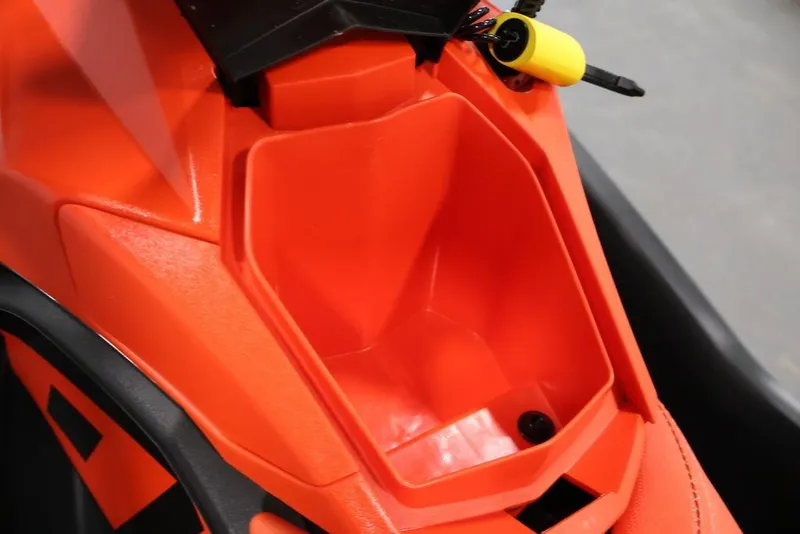 Slide: The Image of 2022 Sea-Doo Spark for 2, orange storage compartment detail. - 6