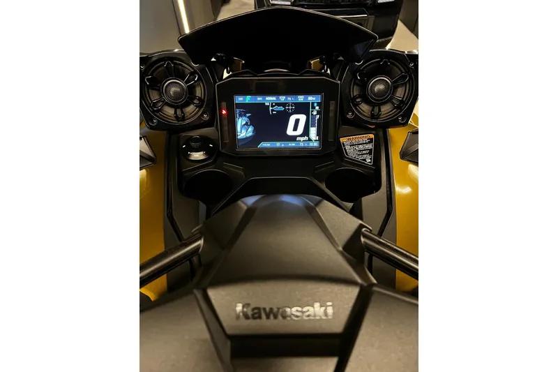 Slide: The Image of 2023 Kawasaki Jetski Ultra 310LX dashboard with digital display and controls. - 10