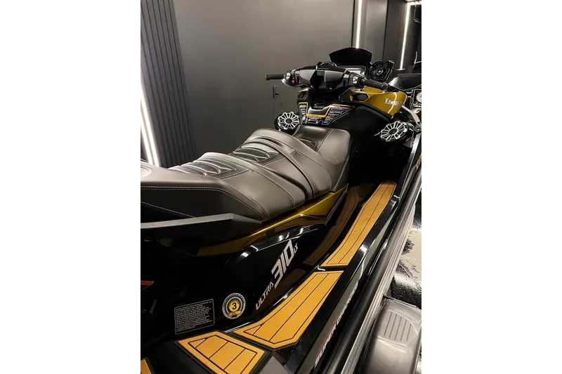Slide: The Image of 2023 Kawasaki Jetski Ultra 310LX with sleek design and luxurious seating. - 4