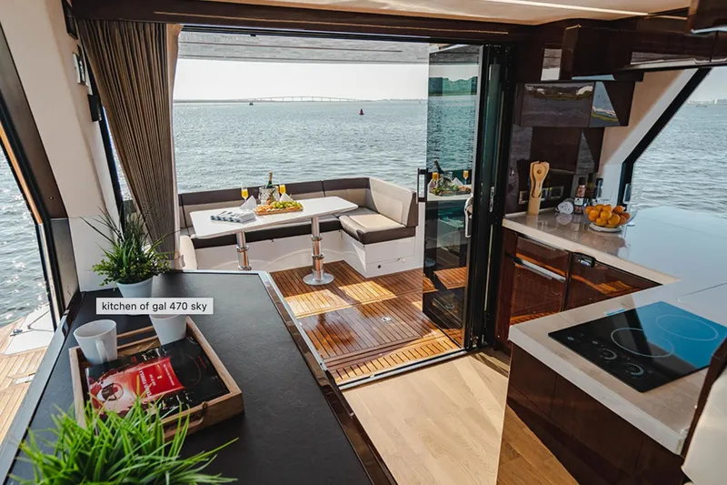 Slide: The Image of Luxurious kitchen interior of 2024 Galeon 470 Sky yacht with ocean view. - 8