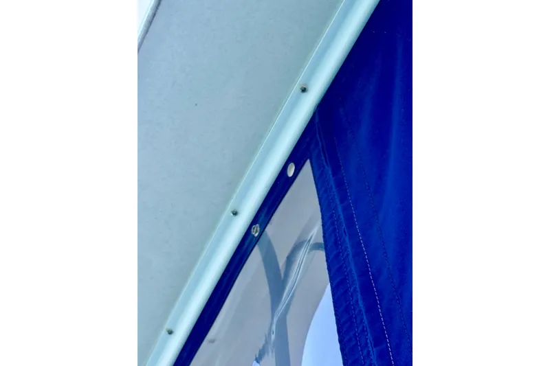 Slide: The Image of Close-up of Californian 35 Motor Yacht's blue and white canopy, 1985 model. - 18