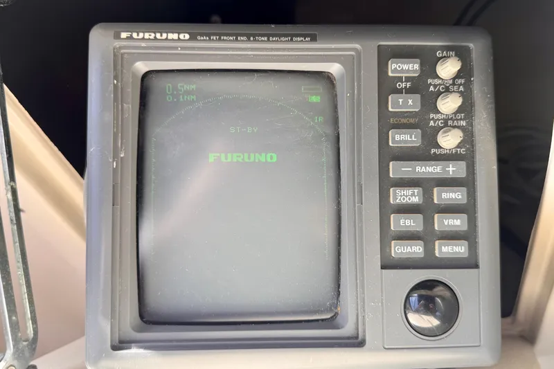 Slide: The Image of Furuno radar display on 1985 Californian 35 Motor Yacht, showing standby mode. - 43