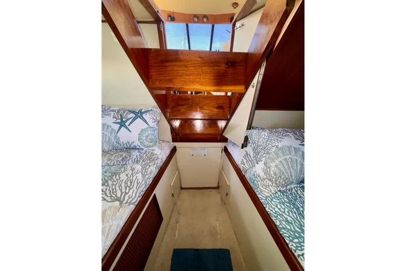 Slide: The Image of Interior of 1985 Californian 35 Motor Yacht with twin beds and nautical decor. - 83