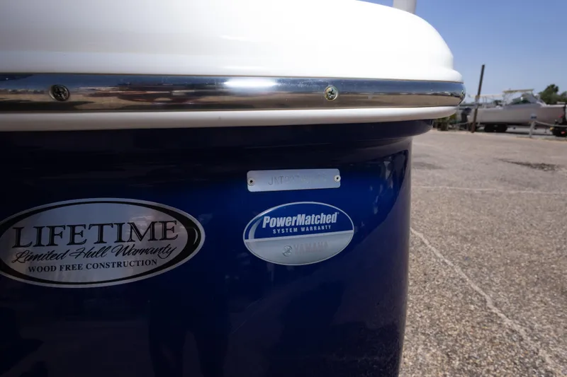 Slide: The Image of 2015 NauticStar 214 XTS boat with lifetime hull warranty and PowerMatched system warranty. - 25