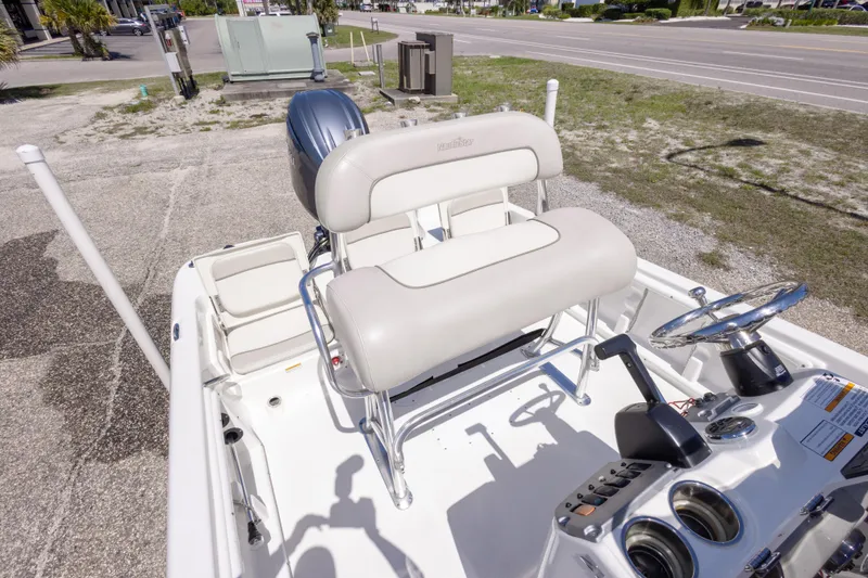 Slide: The Image of 2015 NauticStar 214 XTS boat interior with steering wheel and seating. - 43