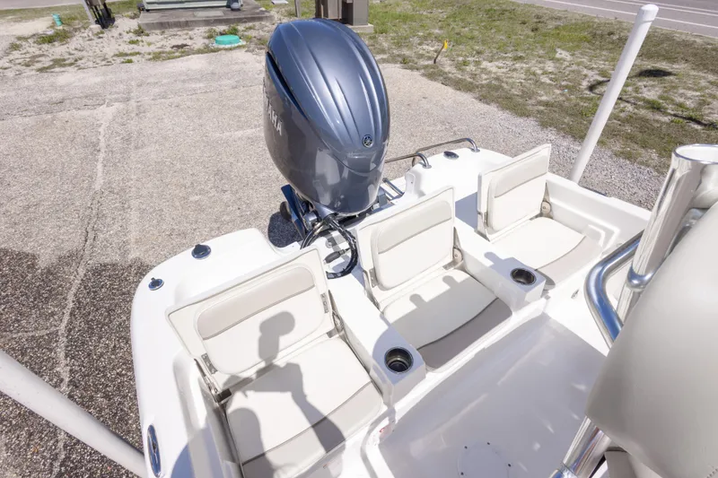 Slide: The Image of 2015 NauticStar 214 XTS boat with Yamaha outboard motor and seating area. - 46