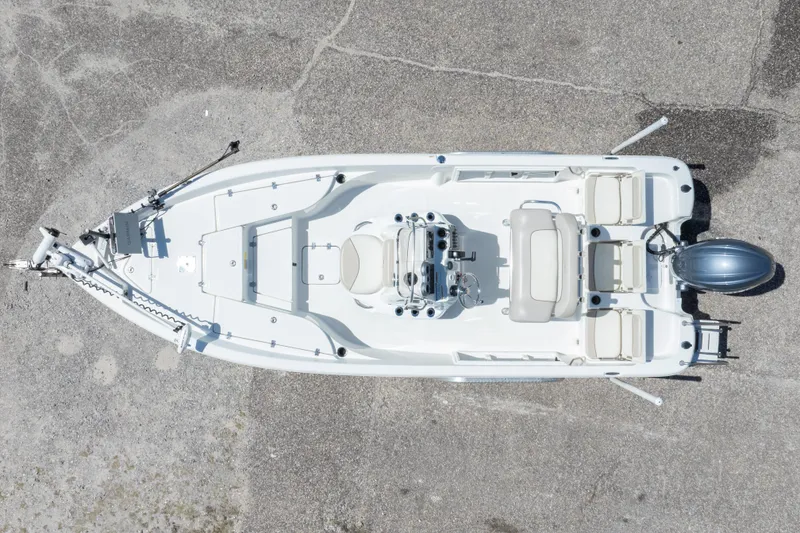 Slide: The Image of Overhead view of a 2015 NauticStar 214 XTS boat on a concrete surface. - 5
